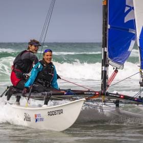 Ollie Voak & Megan Roworth Surfing To Beach And Overall Winners